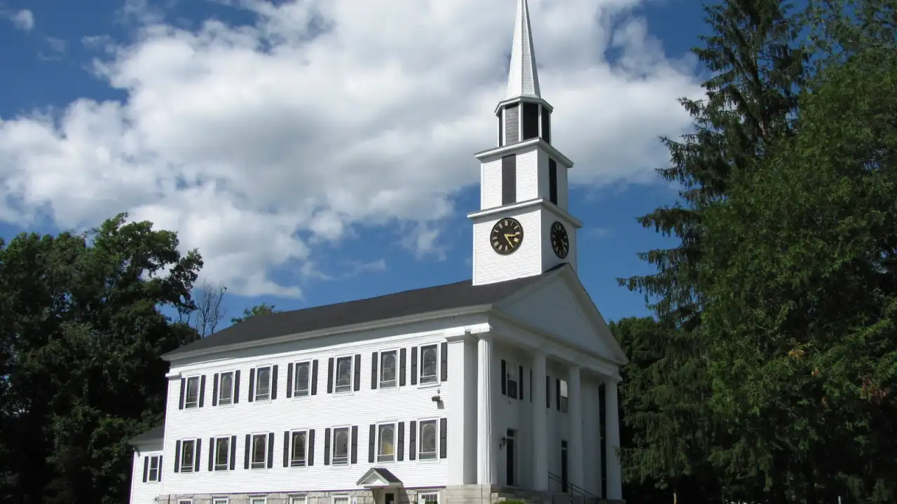 First Congregational Church, a white clapboard church with a tall steeple, Millbury, Massachusetts