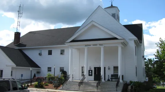 Sutton Town Hall, a white Greek Revival civic building with a columned portico, Sutton, Massachusetts